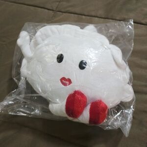 White Plush Toy with Red Accents
